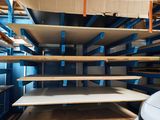 many shelves in the garage with boxes on them
