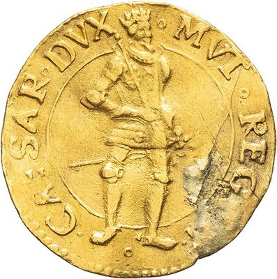 a close up of a gold coin with a man on it
