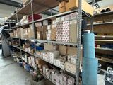 many boxes on the shelves in the warehouse