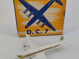 a toy airplane that is sitting in front of a box