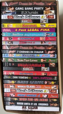 a lot of dvds in a box on the table