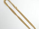 a gold chain necklace with a clasp and a clasp on a white background