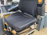 a seat on the back of a construction vehicle