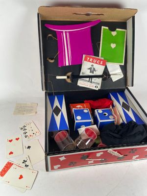 a box with cards and a pair of shoes inside of it