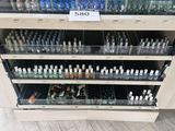 many bottles of nail polish on display in a store