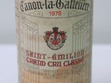 a bottle of wine that is sitting on a table