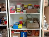 many boxes and boxes on the shelves in the room
