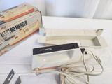a box with a power strip and a box with a power strip
