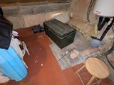 a black box sitting on the floor in a room