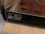a close up view of a toaster oven with food inside of it