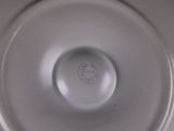 a close up view of a white plate with a cat on it