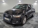 the audi qx is parked on a checkered tile floor
