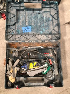 a tool box with tools inside of it on the floor