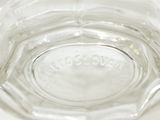 a close up of a clear glass bowl on a table