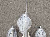 a light that is on the wall next to a lamp