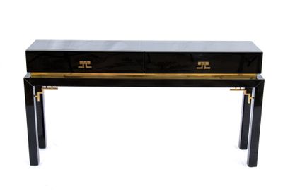 a black and gold console table with two drawers