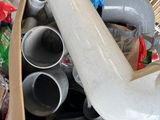 a box full of assorted pipes and pipes