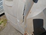 a close up of a tire on the side of the road
