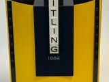 yellow and black bookend with the word britting on it
