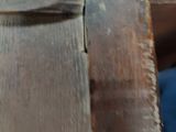 a close up of a piece of wood on a table