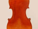 an old violin with a wooden back and a long neck