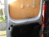 a van door open with the door open and the back door open
