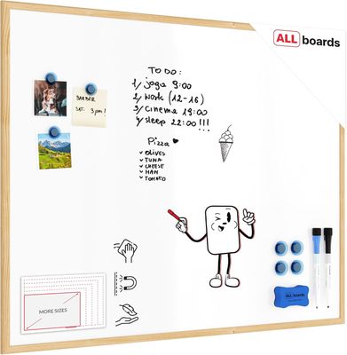 a white board with a drawing of a robot on it