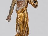 statue of a woman holding her hand up in the air