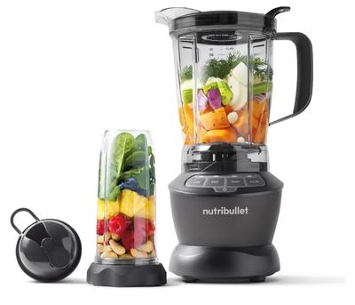 un mixeur contenant divers fruits et légumes