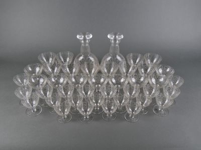 an image of a group of glass vases sitting on top of a table