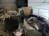an image of a pile of scrap metal in a garage