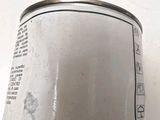 an image of a can of soda on a table