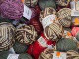 many balls of yarn in a box together
