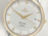 an image of a close up of a wrist watch with roman numerals