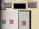 a book with stamps and stamps on it on a table