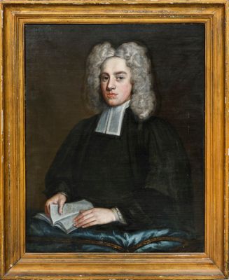 un tableau représentant un homme tenant un livre à la main