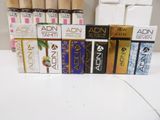 an assortment of cigarettes sitting on top of a table next to each other