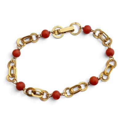 un bracelet rouge et doré à maillons