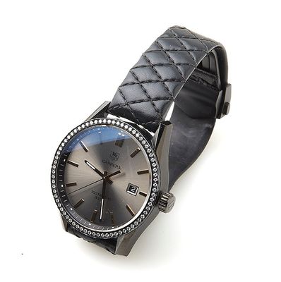 TAG HEUER. Montre de dame modèle Carrera.