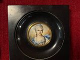 a picture of a miniature portrait of a woman