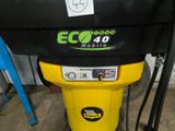 a yellow and black machine that is sitting on the floor
