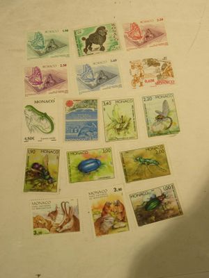 a lot of stamps that are on the table