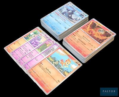several cards are stacked on top of each other on a black background