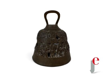 a brown bell with a handle on a white background