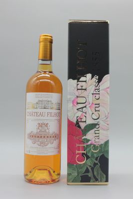 une bouteille de Château Paul dans un coffret sur fond blanc