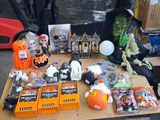 a table with a lot of halloween items on it