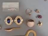 many different types of jewelry on the table