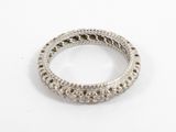 a close up of a silver ring on a white surface