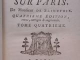 an old book with a picture of a building on it
