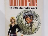 la couverture d'un livre sur laquelle figure une femme tenant une arme à feu